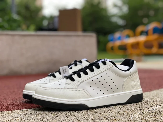 CHANEL 22P Casual Sneakers in White and Black