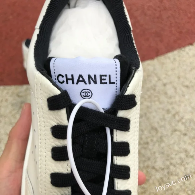 CHANEL 22P Casual Sneakers in White and Black