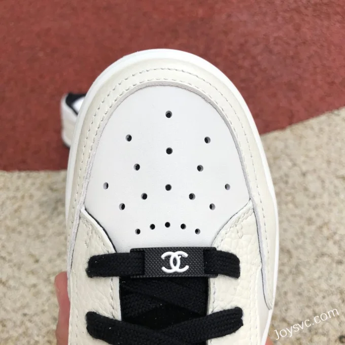 CHANEL 22P Casual Sneakers in White and Black